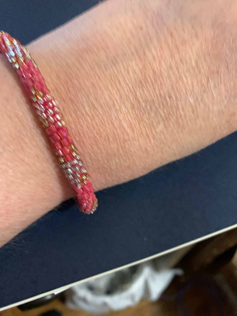 Handwoven Pink Beaded Bracelet with Metallic Accents